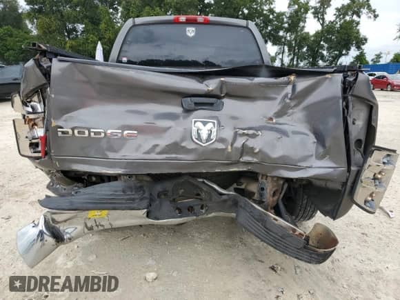 2004 Dodge 1500 SLT z VIN 1D7HA18N14S672882, wystawiony jako Copart lot #73353814 z przebiegiem 131 622 mil mil oraz Szkoda całkowita • Salvage title. Historia ofert i sprzedaży dostępna na DreamBid. Obrazek 6.