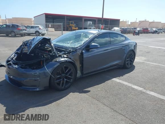 ✅ 2022 Tesla Model S • VIN: 5YJSA1E55NF483364 • Лот: 41755502. Опубликован ранее на IAAI с пробегом 19 396 миль. Бесплатный доступ к архиву аукционных продаж из США и подробный отчёт об истории автомобиля на DreamBid. Изображение 2.