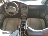 ✅ 2002 Saturn SC • VIN: 1G8ZP12862Z207321 • Lot: 93765115. Wystawiony na Copart z przebiegiem 171 869 mil. Bezpłatny archiwum sprzedaży aukcyjnych z USA i szczegółowy raport historii pojazdu na DreamBid. Zdjęcie 8.