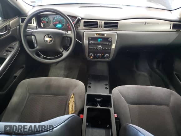 2013 Chevrolet Impala Police с VIN 2G1WD5E3XD1258334, выставлен на аукционе Copart как лот 61849625 с пробегом 99 903 миль миль и Списание • Salvage title. История ставок и продаж доступна на DreamBid. Изображение 8.