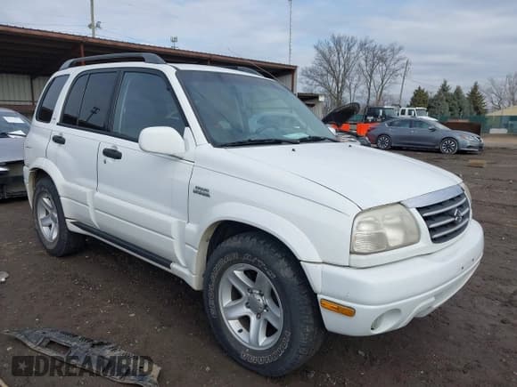 ✅ 2001 Suzuki Grand Vitara JLX • VIN: JS3TD62V114157738 • Lot: 41721813. Wystawiony na IAAI z przebiegiem 134 661 mil. Bezpłatny archiwum sprzedaży aukcyjnych z USA i szczegółowy raport historii pojazdu na DreamBid. Zdjęcie 1.