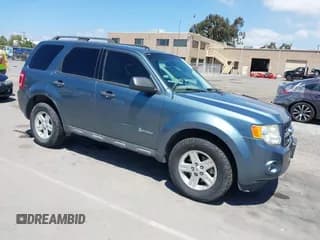 ✅ 2011 Ford Escape Hybrid • VIN: 1FMCU4K30BKC54584 • Lot: 42131257. Listed on IAAI with 107,905 mi. Free auction sales archive from the USA and detailed vehicle history report at DreamBid. Image 1.
