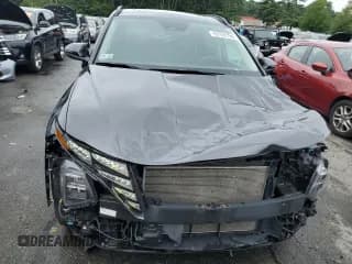 ✅ 2022 Hyundai Tucson SEL • VIN: 5NMJFCAE0NH008797 • Lot: 63122194. Wystawiony na Copart z przebiegiem 31 152 mil. Bezpłatny archiwum sprzedaży aukcyjnych z USA i szczegółowy raport historii pojazdu na DreamBid. Zdjęcie 5.