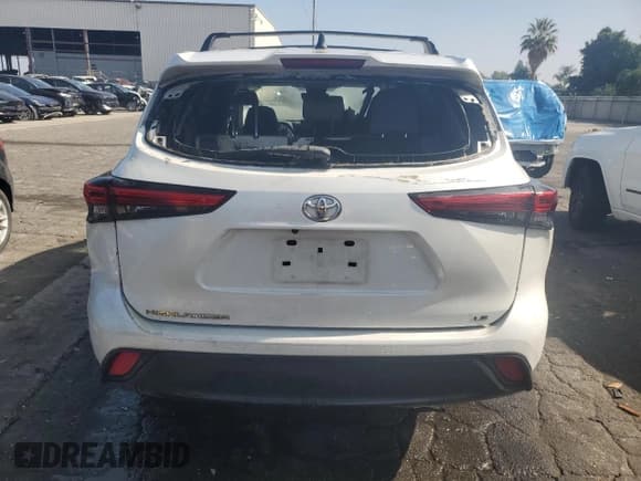 ✅ 2022 Toyota Highlander LE • VIN: 5TDZZRAH2NS142389 • Lot: 90516555. Listed on Copart with 88,574 mi. Free auction sales archive from the USA and detailed vehicle history report at DreamBid. Image 6.