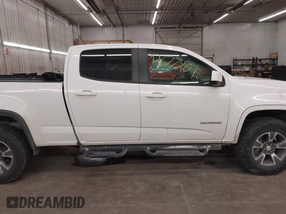 2015 Chevrolet Colorado 4WD Z71 z VIN 1GCGTCE36F1265552, wystawiony jako IAAI lot #42677201 z przebiegiem 168 895 mil mil oraz . Historia ofert i sprzedaży dostępna na DreamBid. Obrazek 14.