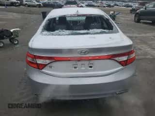 2013 Hyundai Azera с VIN KMHFG4JG3DA202044, выставлен на аукционе Copart как лот 83224014 с пробегом 75 114 миль миль и Списание • Salvage title. История ставок и продаж доступна на DreamBid. Изображение 6.