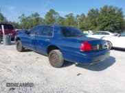 ✅ 2002 Ford Police Interceptor • VIN: 2FAFP71W72X157701 • Lot: 43719670. Listed on IAAI with 155,894 mi. Free auction sales archive from the USA and detailed vehicle history report at DreamBid. Image 3.