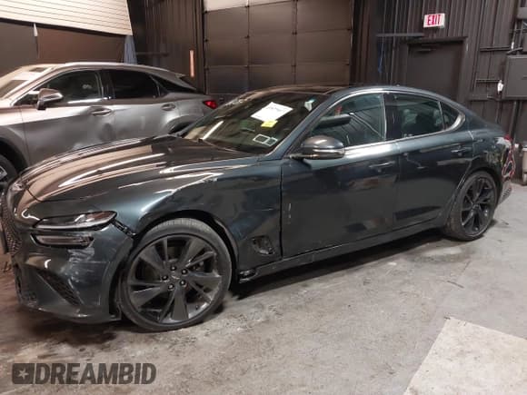 ✅ 2023 Genesis G70 2.0T • VIN: KMTG34TA3PU115553 • Лот: 41822917. Опубликован ранее на IAAI с пробегом 35 784 миль. Бесплатный доступ к архиву аукционных продаж из США и подробный отчёт об истории автомобиля на DreamBid. Изображение 6.