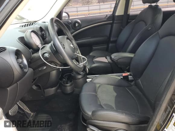 ✅ 2014 MINI Countryman S • VIN: WMWZC3C51EWP26751 • Lot: 49165415. Listed on Copart with 131,590 mi. Free auction sales archive from the USA and detailed vehicle history report at DreamBid. Image 7.