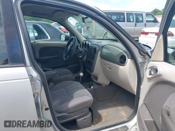 ✅ 2003 Chrysler PT Cruiser Touring • VIN: 3C4FY58B83T557431 • Lot: 42201406. Listed on IAAI with 208,474 mi. Free auction sales archive from the USA and detailed vehicle history report at DreamBid. Image 5.