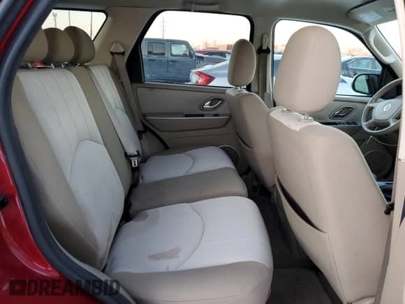 2006 Mercury Mariner Luxury with VIN 4M2YU56146DJ09769, listed as a Copart auction lot 87851795 with 80,894 mi miles and Salvage title. Bid and sale history available at DreamBid. Image 11.