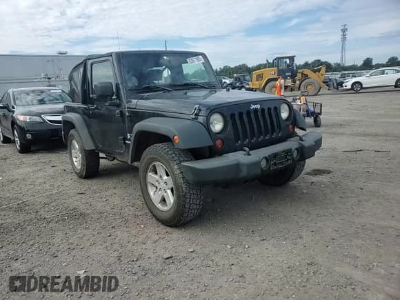 ✅ 2009 Jeep Wrangler X • VIN: 1J4FA24179L742536 • Лот: 83971805. Опубликован ранее на Copart с пробегом 209 697 миль. Бесплатный доступ к архиву аукционных продаж из США и подробный отчёт об истории автомобиля на DreamBid. Изображение 13.