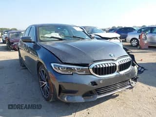 ✅ 2020 BMW 3 Series 330i • VIN: 3MW5R1J00L8B17584 • Lot: 43376320. Listed on IAAI with 48,928 mi. Free auction sales archive from the USA and detailed vehicle history report at DreamBid. Image 1.