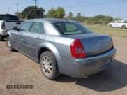 ✅ 2007 Chrysler 300 C • VIN: 2C3LK63H87H827573 • Lot: 43379556. Listed on IAAI with 180,668 mi. Free auction sales archive from the USA and detailed vehicle history report at DreamBid. Image 3.
