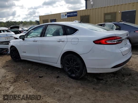 ✅ 2017 Ford Fusion Hybrid S • VIN: 3FA6P0UU0HR360678 • Lot: 85511465. Wystawiony na Copart z przebiegiem 104 755 mil. Bezpłatny archiwum sprzedaży aukcyjnych z USA i szczegółowy raport historii pojazdu na DreamBid. Zdjęcie 2.