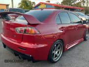 ✅ 2015 Mitsubishi Lancer Evolution GSR • VIN: JA32W8FV5FU026599 • Лот: 79051554. Опубликован ранее на Copart с пробегом 82 279 миль. Бесплатный доступ к архиву аукционных продаж из США и подробный отчёт об истории автомобиля на DreamBid. Изображение 4.