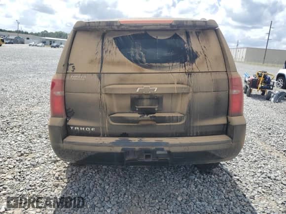 2019 Chevrolet Tahoe LS с VIN 1GNSCAEC1KR374535, выставлен на аукционе Copart как лот 81609295 с пробегом 100 726 миль миль и Списание • Salvage title. История ставок и продаж доступна на DreamBid. Изображение 6.