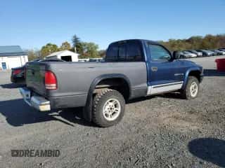 2000 Dodge Dakota Sport z VIN 1B7GG26N6YS599527, wystawiony jako Copart lot #73604624 z przebiegiem 102 127 mil mil oraz Czysty tytuł • Clean title. Historia ofert i sprzedaży dostępna na DreamBid. Obrazek 3.