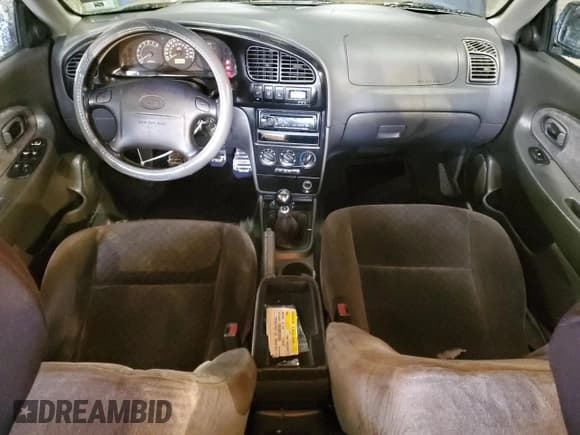 ✅ 2003 Kia Spectra GS • VIN: KNAFB161135104592 • Lot: 52097205. Wystawiony na Copart z przebiegiem 119 206 mil. Bezpłatny archiwum sprzedaży aukcyjnych z USA i szczegółowy raport historii pojazdu na DreamBid. Zdjęcie 8.