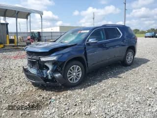 ✅ 2023 Chevrolet Traverse LT Cloth • VIN: 1GNERGKW7PJ240311 • Lot: 69954945. Wystawiony na Copart z przebiegiem 26 568 mil. Bezpłatny archiwum sprzedaży aukcyjnych z USA i szczegółowy raport historii pojazdu na DreamBid. Zdjęcie 1.