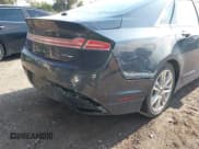 ✅ 2014 Lincoln MKZ • VIN: 3LN6L2G90ER830465 • Lot: 42862520. Listed on IAAI with 120,532 mi. Free auction sales archive from the USA and detailed vehicle history report at DreamBid. Image 6.