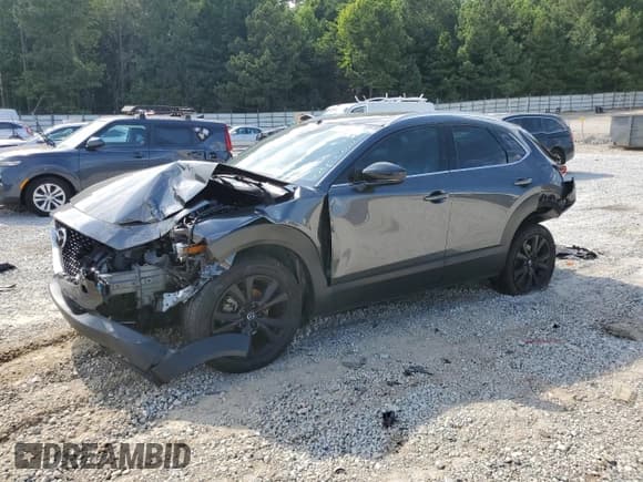 ✅ 2023 Mazda CX-30 Premium • VIN: 3MVDMBDY7PM572335 • Lot: 66309425. Wystawiony na Copart z przebiegiem 87 436 mil. Bezpłatny archiwum sprzedaży aukcyjnych z USA i szczegółowy raport historii pojazdu na DreamBid. Zdjęcie 1.