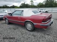 ✅ 1989 Chrysler LeBaron • VIN: 1C3XJ45J8KG223051 • Lot: 75115464. Listed on Copart with 27,923 mi. Free auction sales archive from the USA and detailed vehicle history report at DreamBid. Image 2.