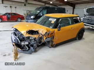 2014 MINI Hardtop with VIN WMWXM5C59ET972173, listed as a Copart auction lot 62384095 with 93,285 mi miles and Salvage title. Bid and sale history available at DreamBid. Image 1.