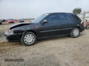 ✅ 1998 Subaru Impreza L • VIN: JF1GF4354WG805257 • Lot: 73696134. Listed on Copart with 141,441 mi. Free auction sales archive from the USA and detailed vehicle history report at DreamBid. Image 1.