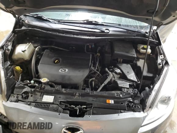 ✅ 2012 Mazda 5 Grand Touring • VIN: JM1CW2DL5C0143414 • Lot: 92329075. Listed on Copart with 107,084 mi. Free auction sales archive from the USA and detailed vehicle history report at DreamBid. Image 11.