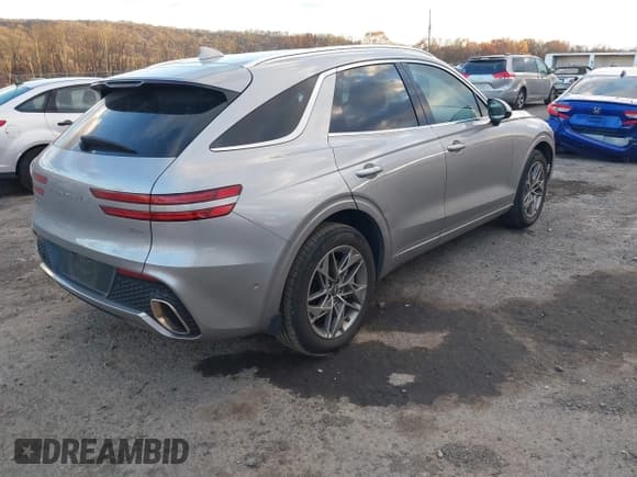 ✅ 2023 Genesis GV70 2.5T • VIN: KMUMADTB6PU130349 • Lot: 43700475. Listed on IAAI with 31,124 mi. Free auction sales archive from the USA and detailed vehicle history report at DreamBid. Image 4.