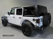 ✅ 2022 Jeep Wrangler Unlimited Willys Sport • VIN: 1C4HJXDN3NW263019 • Лот: 41880705. Опубликован ранее на Copart с пробегом 16 231 миль. Бесплатный доступ к архиву аукционных продаж из США и подробный отчёт об истории автомобиля на DreamBid. Изображение 3.