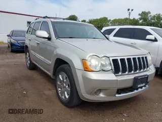 ✅ 2009 Jeep Grand Cherokee • VIN: 1J8HR68T59C520547 • Lot: 42928715. Listed on IAAI with 168,824 mi. Free auction sales archive from the USA and detailed vehicle history report at DreamBid. Image 1.