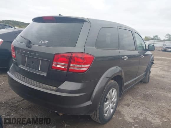 ✅ 2014 Dodge Journey American Value • VIN: 3C4PDCAB9ET303292 • Lot: 43546866. Listed on IAAI with 182,853 mi. Free auction sales archive from the USA and detailed vehicle history report at DreamBid. Image 4.