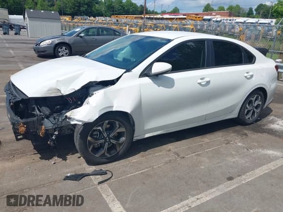 ✅ 2021 Kia Forte LXS • VIN: 3KPF24AD8ME394275 • Lot: 42322720. Listed on IAAI with 62,658 mi. Free auction sales archive from the USA and detailed vehicle history report at DreamBid. Image 2.