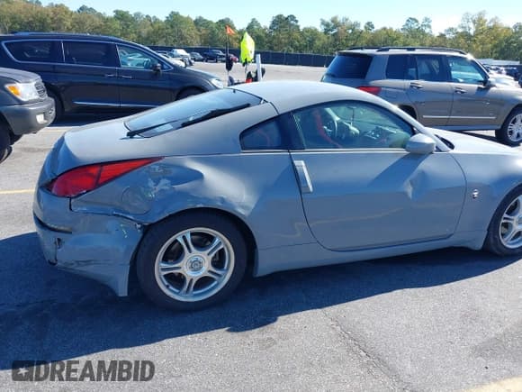 ✅ 2003 Nissan 350Z Touring • VIN: JN1AZ34D83T108171 • Лот: 43517151. Опубликован ранее на IAAI с пробегом 141 503 миль. Бесплатный доступ к архиву аукционных продаж из США и подробный отчёт об истории автомобиля на DreamBid. Изображение 6.