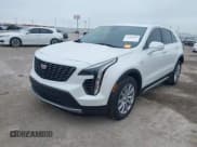 ✅ 2023 Cadillac XT4 FWD Premium Luxury • VIN: 1GYFZCR49PF225817 • Лот: 42408494. Опубликован ранее на IAAI с пробегом 5 977 миль. Бесплатный доступ к архиву аукционных продаж из США и подробный отчёт об истории автомобиля на DreamBid. Изображение 2.