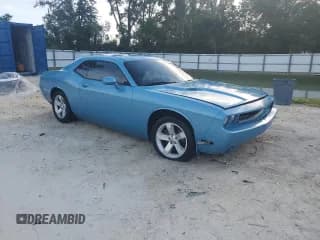 ✅ 2012 Dodge Challenger SXT Plus • VIN: 2C3CDYAG7CH100693 • Lot: 84772665. Wystawiony na Copart z przebiegiem 129 067 mil. Bezpłatny archiwum sprzedaży aukcyjnych z USA i szczegółowy raport historii pojazdu na DreamBid. Zdjęcie 4.