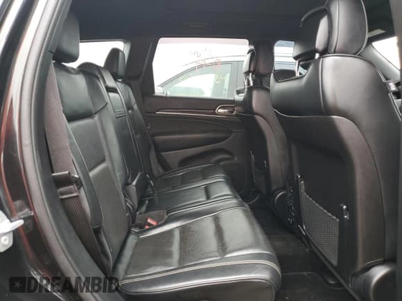 ✅ 2015 Jeep Grand Cherokee Overland • VIN: 1C4RJFCM7FC880093 • Lot: 82241784. Listed on Copart with 158,346 mi. Free auction sales archive from the USA and detailed vehicle history report at DreamBid. Image 10.