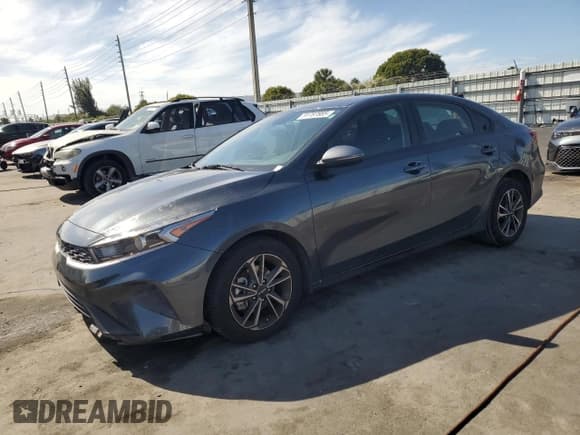 ✅ 2023 Kia Forte LXS • VIN: 3KPF24AD5PE648917 • Лот: 91787885. Опубликован ранее на Copart с пробегом 72 561 миль. Бесплатный доступ к архиву аукционных продаж из США и подробный отчёт об истории автомобиля на DreamBid. Изображение 1.