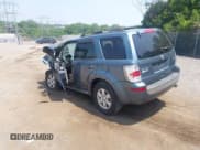 ✅ 2010 Mercury Mariner • VIN: 4M2CN9BG3AKJ28830 • Lot: 42328802. Listed on IAAI with 116,650 mi. Free auction sales archive from the USA and detailed vehicle history report at DreamBid. Image 3.