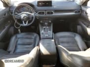 ✅ 2021 Mazda CX-5 Grand Touring • VIN: JM3KFADM1M0358358 • Lot: 90920865. Listed on Copart with 108,573 mi. Free auction sales archive from the USA and detailed vehicle history report at DreamBid. Image 8.