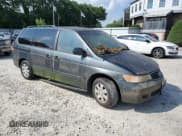 ✅ 2003 Honda Odyssey EX • VIN: 5FNRL18603B057821 • Лот: 61977074. Опубликован ранее на Copart с пробегом 59 883 миль. Бесплатный доступ к архиву аукционных продаж из США и подробный отчёт об истории автомобиля на DreamBid. Изображение 4.