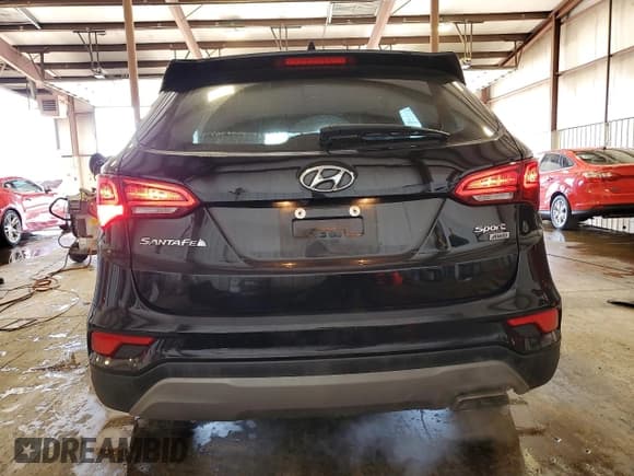 ✅ 2018 Hyundai Santa Fe 2.4L • VIN: 5XYZUDLB6JG528556 • Лот: 91180075. Опубликован ранее на Copart с пробегом 87 693 миль. Бесплатный доступ к архиву аукционных продаж из США и подробный отчёт об истории автомобиля на DreamBid. Изображение 6.