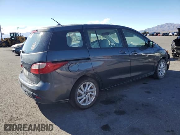 ✅ 2013 Mazda 5 Sport • VIN: JM1CW2BL0D0147388 • Lot: 86678935. Listed on Copart with 203,072 mi. Free auction sales archive from the USA and detailed vehicle history report at DreamBid. Image 3.