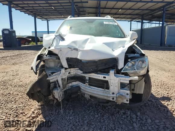 2014 Chevrolet Captiva Sport LTZ с VIN 3GNAL4EK0ES669857, выставлен на аукционе Copart как лот 71361204 с пробегом Не указан миль и Списание • Salvage title. История ставок и продаж доступна на DreamBid. Изображение 5.