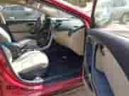 2014 Hyundai Elantra SE z VIN 5NPDH4AE0EH542141, wystawiony jako IAAI lot #43364595 z przebiegiem 70 576 mil mil oraz . Historia ofert i sprzedaży dostępna na DreamBid. Obrazek 5.