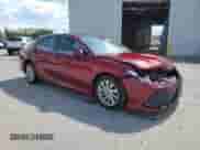 2021 Toyota Camry LE with VIN 4T1C11BK0MU023660, listed as a Copart auction lot 70505895 with 54,746 mi miles and Salvage title. Bid and sale history available at DreamBid. Image 4.