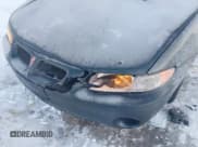 ✅ 2001 Pontiac Grand Prix SE • VIN: 1G2WK52J21F204244 • Lot: 41285767. Listed on IAAI with 183,758 mi. Free auction sales archive from the USA and detailed vehicle history report at DreamBid. Image 6.