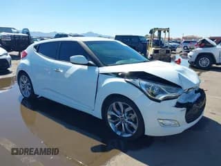 ✅ 2014 Hyundai Veloster • VIN: KMHTC6AD4EU213537 • Lot: 43358808. Wystawiony na IAAI z przebiegiem 54 973 mil. Bezpłatny archiwum sprzedaży aukcyjnych z USA i szczegółowy raport historii pojazdu na DreamBid. Zdjęcie 1.